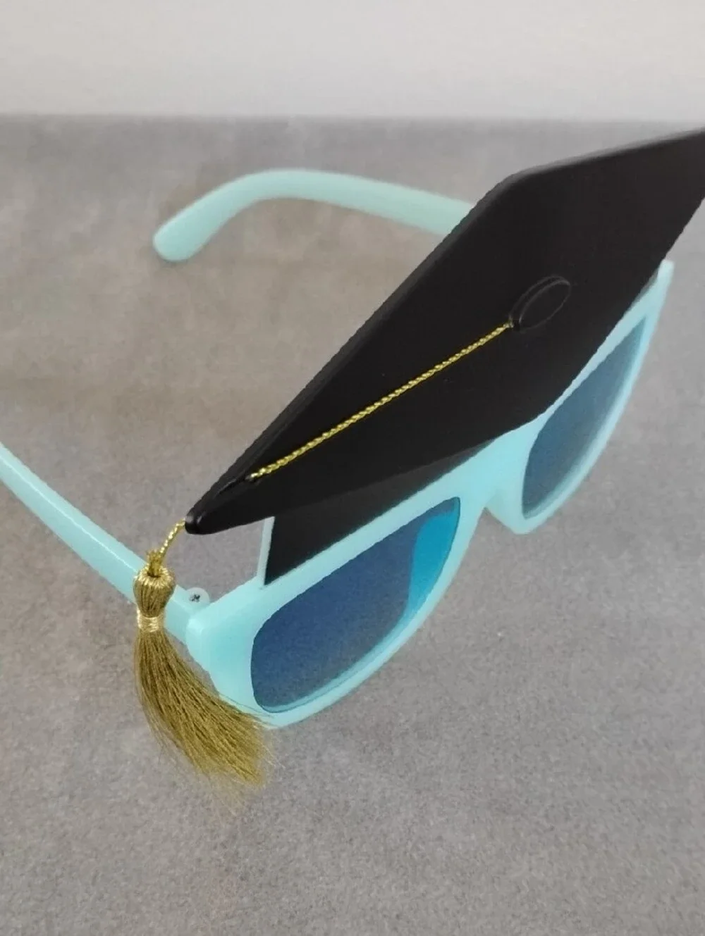 NWOT Graduation Sunglasses in Light Blue with Black Cap